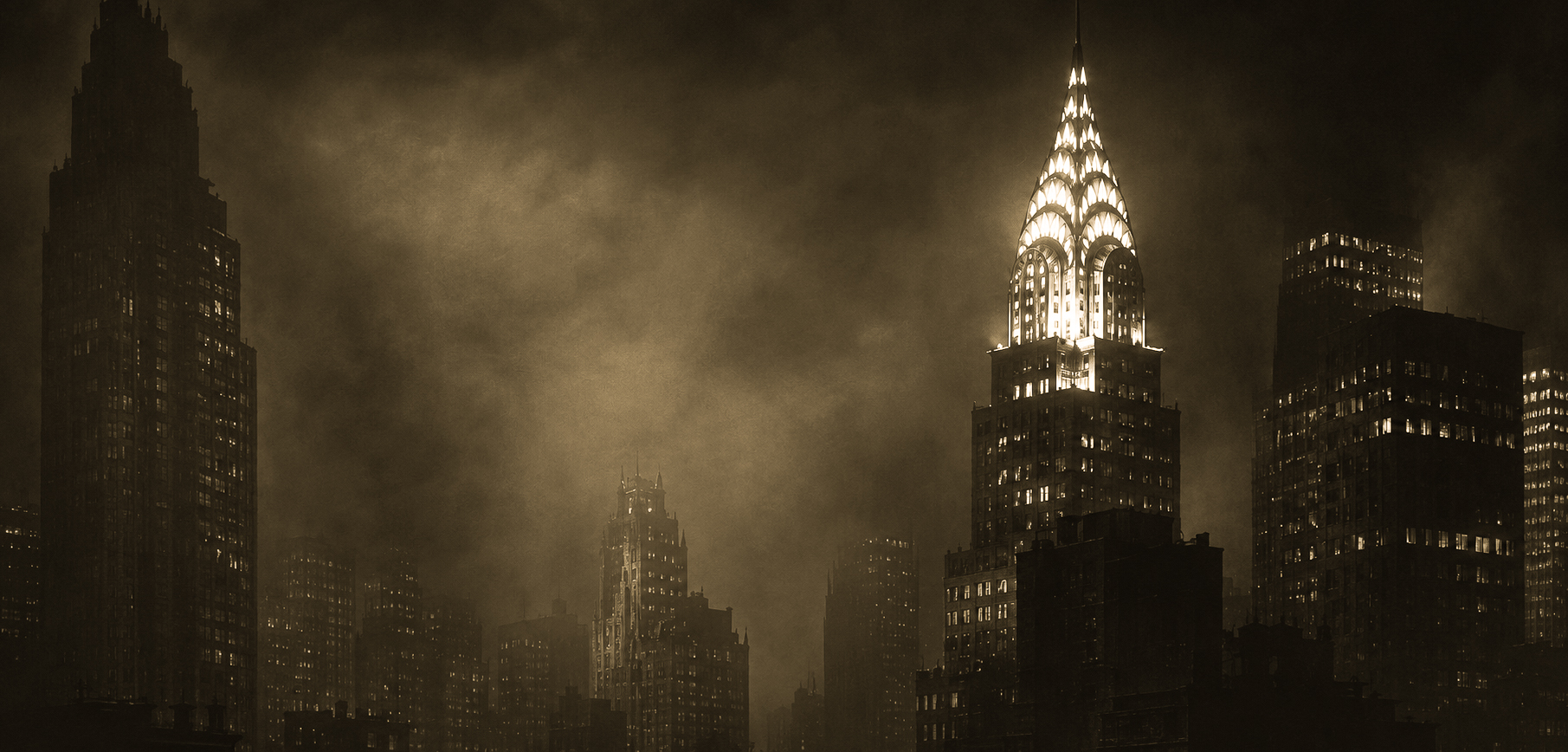 Manhattan skyline at night with the illuminated Chrysler Building