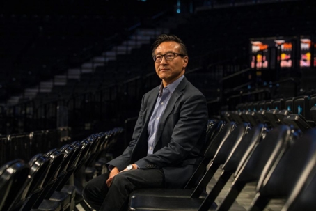 man sitting in auditorium