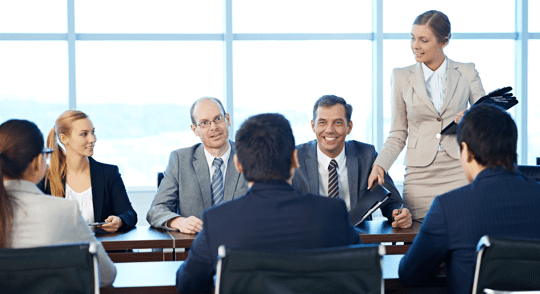 team of people meeting in conference room