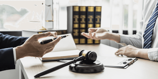 Two people discussing legal matters