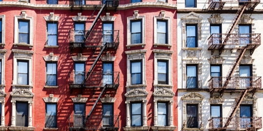 apartment building with windows and stairs