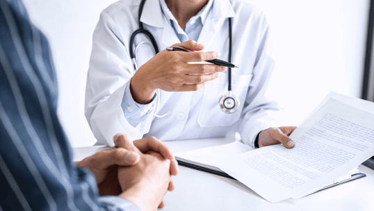 doctor reviewing documents