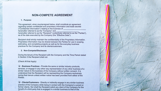 Contract Agreement next to a pen
