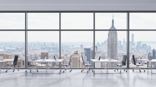 tables and chairs wit skyline view