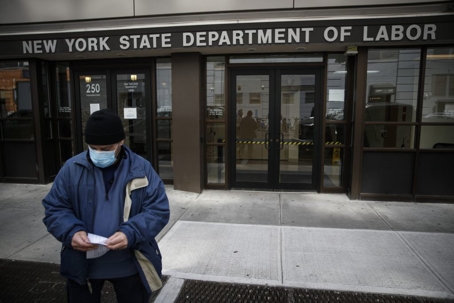 man standing outside of department of labor