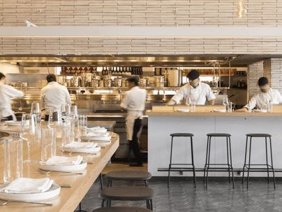 table set up with kitchen in the background